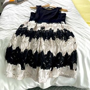 Tank dress with embroidered lace bottom.